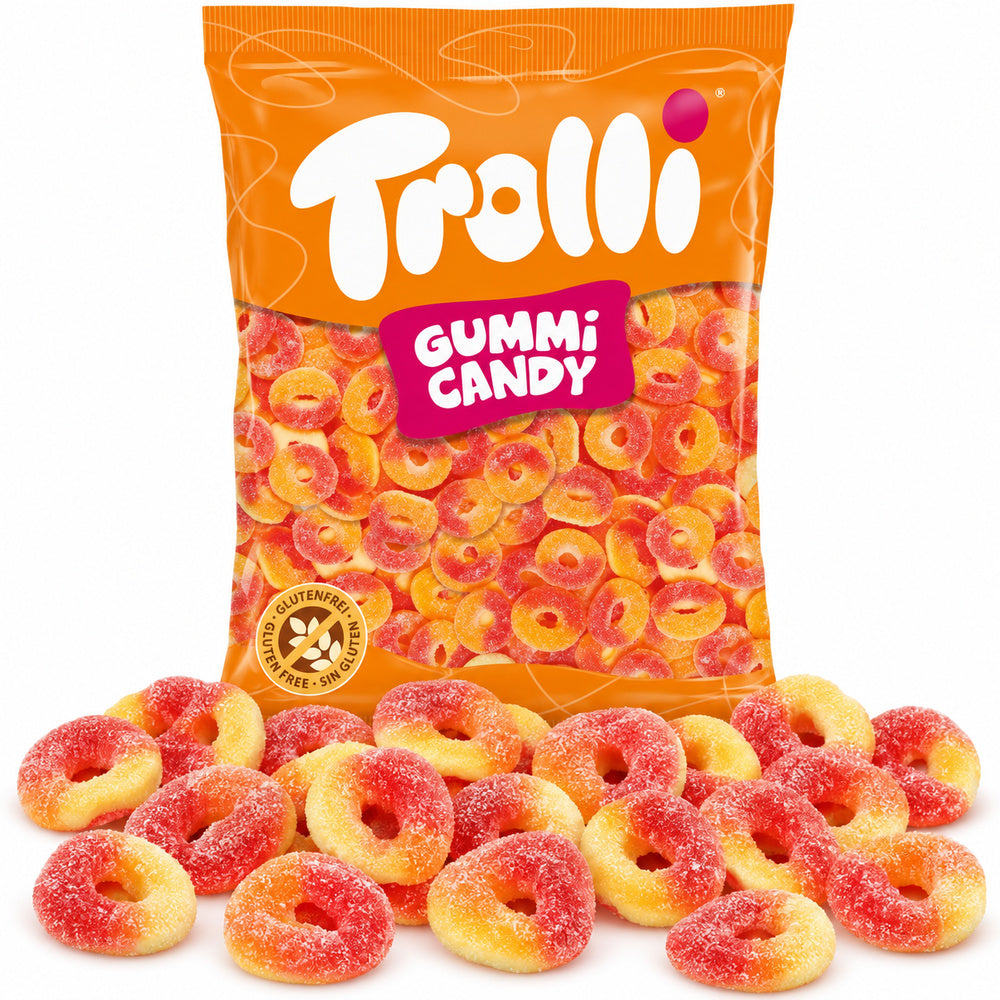 Aros Melocotón Trolli 1 kg con gominolas delante sobre fondo blanco